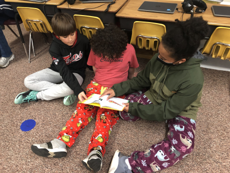 5th grade students read to their buddy