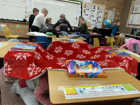 students working together to build forts