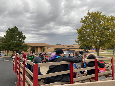 1st Graders leave the school in the wagons