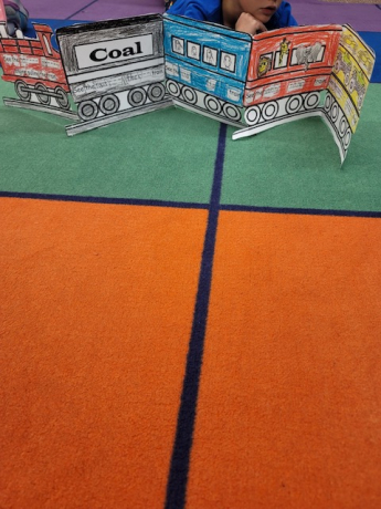 The students had fun choosing different colors for their trains