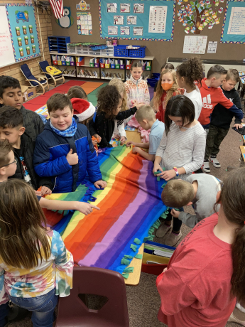 3rd graders tie blankets for Project Linus