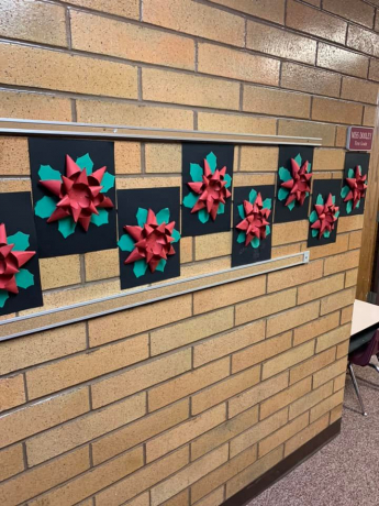 Student poinsettias in the hall
