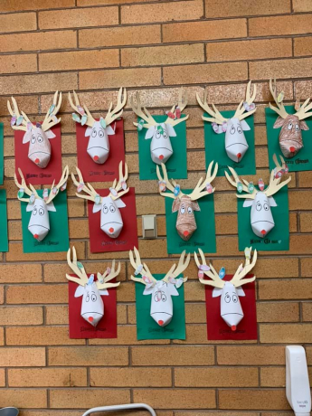 Student's reindeer heads in the hall