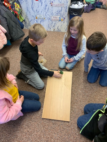 A group of students preparing to conduct their experiment