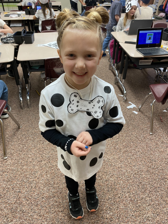 A student all dressed up as a Dalmatian puppy