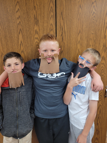 5th grade boys show off their beards