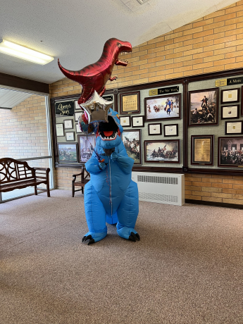 Dinosaur visiting for Miss Nielsen's birthday