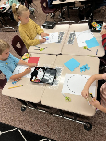 Children designing their artwork
