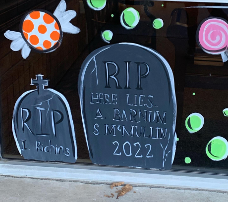 Tombstones read "RIP I Richins" and "RIP HERE LIES A BARNUM S MCMULLIN 2022"