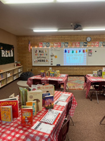 Tables set up with books before students arrive