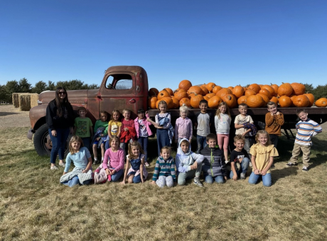 Mrs. Barnum's Class in front of the pumpkin truck