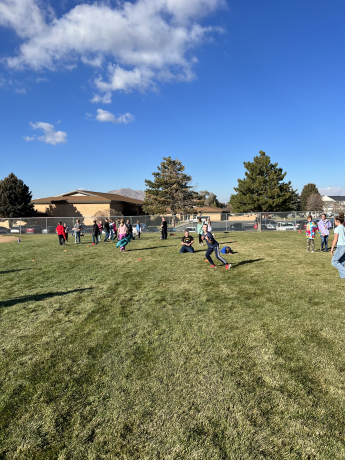 Santaquin Students running free on the grass