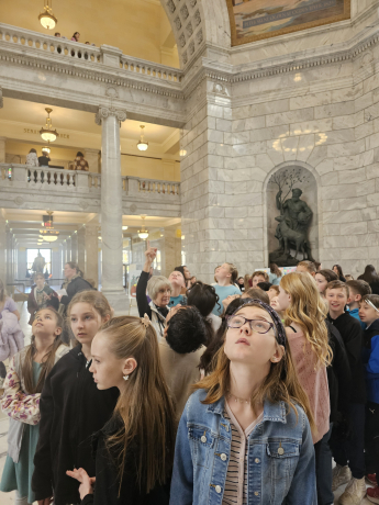 students getting a tour of the capitol building